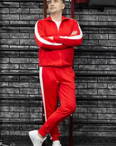 imgi_97_thin-man-red-tracksuit-poses-against-wall-gym_199620-8066